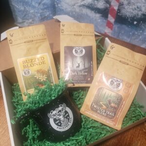 2-4 oz bags of coffee beans whole or ground buzzed blonde and 1 coffee mug